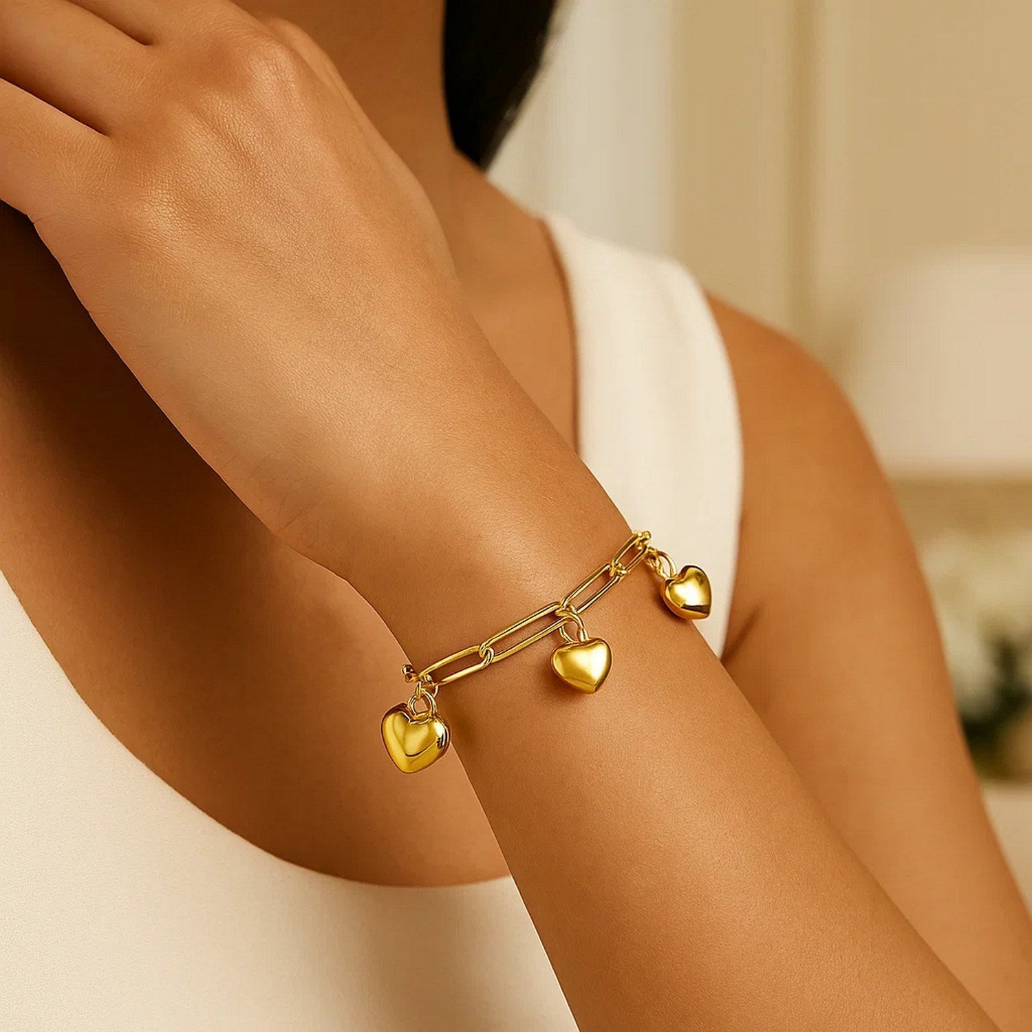 14K Yellow Gold Puffed Heart Charm Bracelet